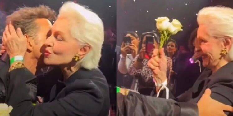 Carolina Herrera recibe flores y un beso de Luis Miguel en pleno concierto